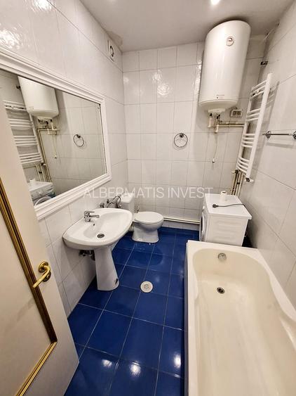Vinzare apartament renovat cu design italian in  Piata Romana - 17