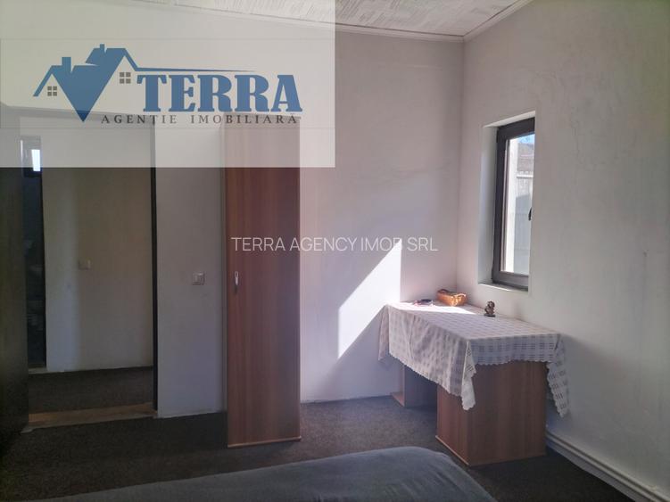 Casă Mioveni, 4 camere, teren 1.225 mp, toate utili