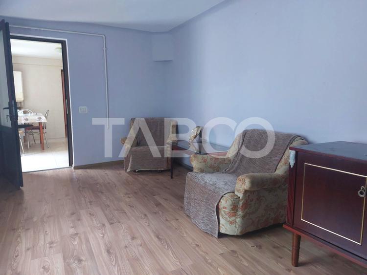 Casa in zona centrala 5 camere 2 bucatarii 3 bai curte comuna Cisnadie