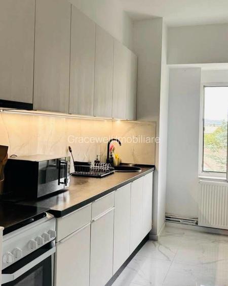 Apartament modern ultracentral, 2 camere, loc de parcare inclus, living spatios - 2