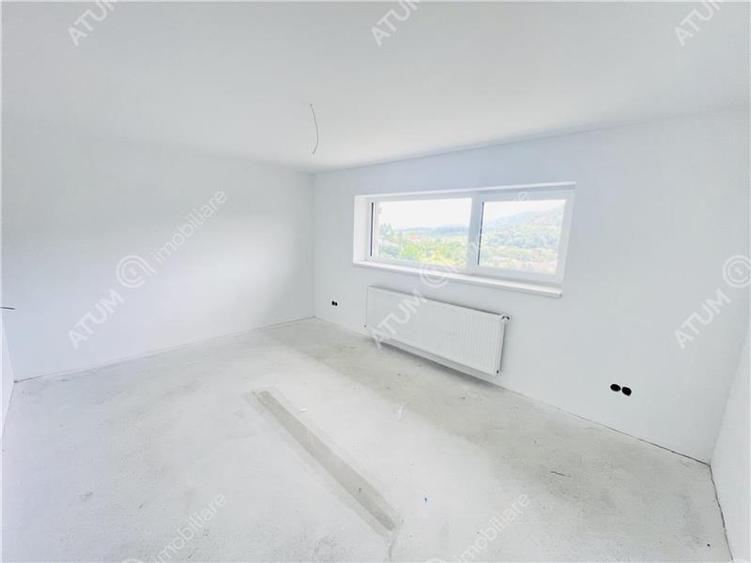 Casa individuala in Cisnadioara cu 4 camere 2 bai terasa teren 1170 mp