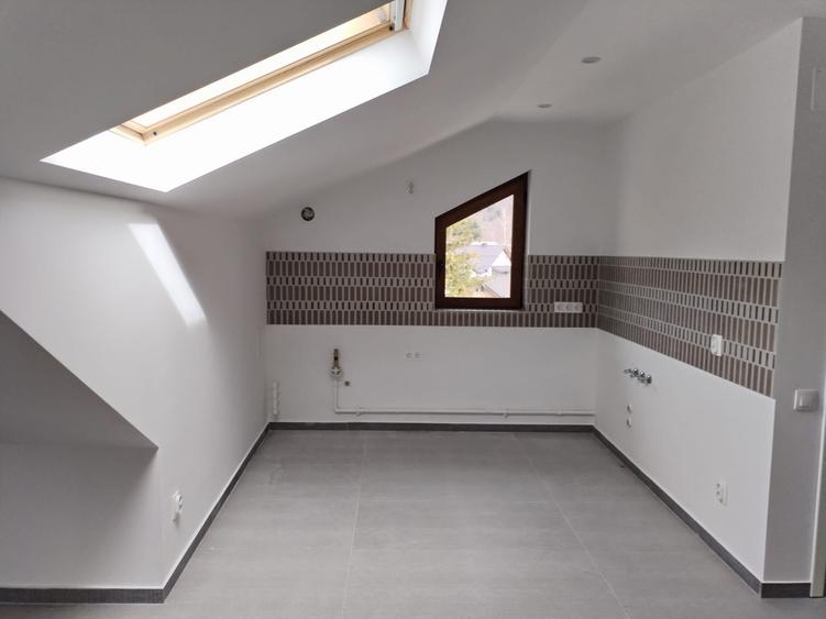Apartament la mansarda vedere deosebita