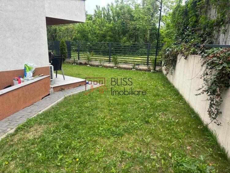 Apartament cu grădină generoasă și parcare