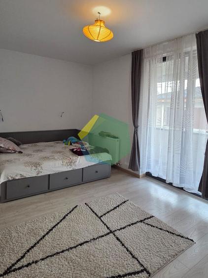 Casă tip duplex P+1+M, cu mansardă de 50 mp și curte generoasă