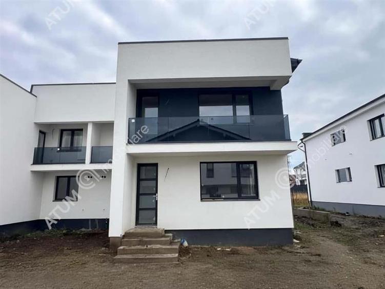 Casa cu 4 camere 2 bai curte de 50 mp zona Calea Cisnadiei Sibiu