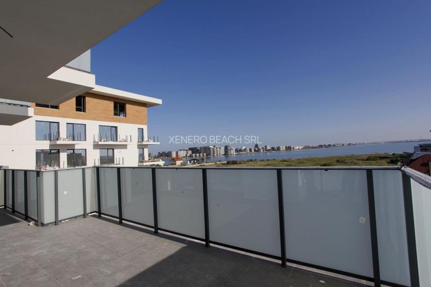Apartament la mare, piscina, loc de joaca pentru copii, vedere la lac - 11