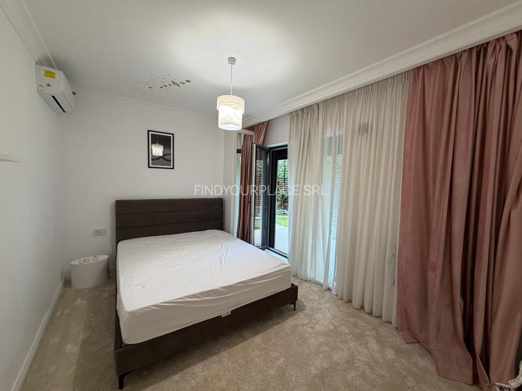 Apartament în Arcadia Domenii,230mp curte,3 parcări incluse
