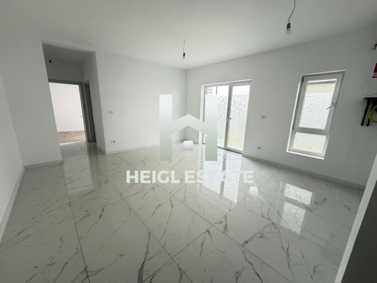 Apartament cu 2 camere si 50 mp teren in zona Braytim