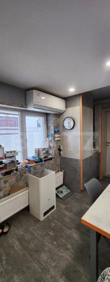 Casa cu 3 camere, 2 bucatarii, Teren de 1000 mp, zona Unirii
