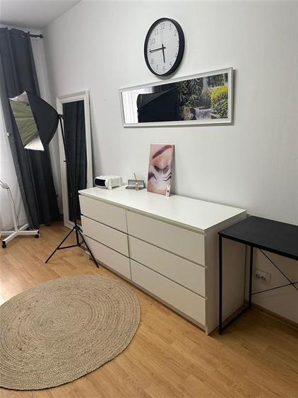 Cabinet de infrumusetare in cadrul unui salon  modern