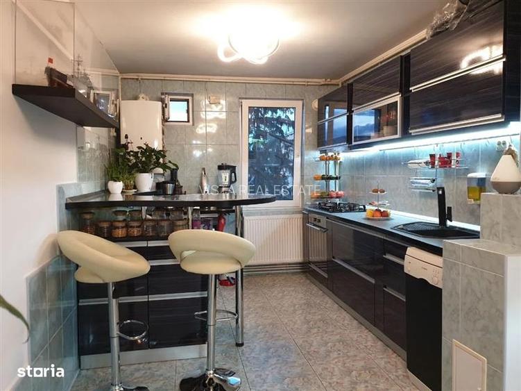 Apartament 4 camere, 2 bai, etaj 3/4, decomandat, cartier Tractorul. - 5