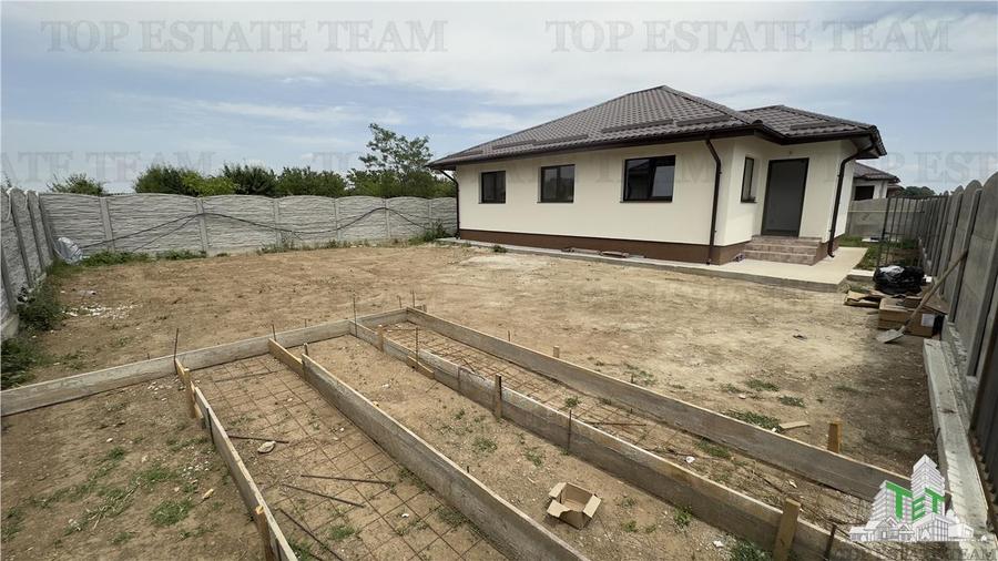 Casa individuala 4 camere pe parter, cu toate utilitatile si 400 mp de teren in