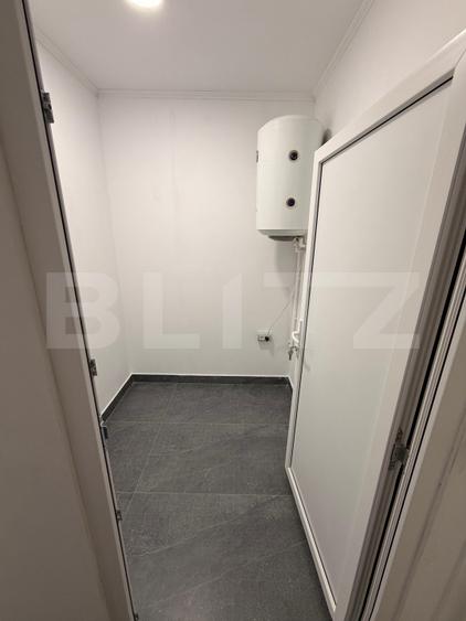 Spațiu 245 mp cu 10 parcări, curte logistică și rampă marfă – DN Raciu