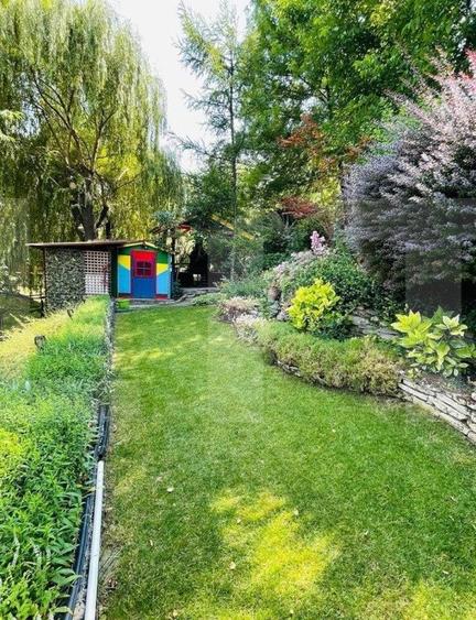 Casa de 5 camere, 310 mp, teren amenajat 1044 mp, Bucium