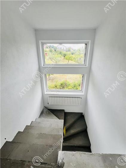 Casa individuala in Cisnadioara cu 4 camere 2 bai terasa teren 1170 mp