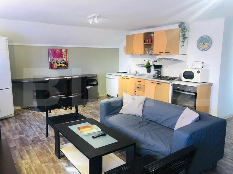 Apartament modern, 3 camere, 120 mp, curte proprie, loc de parcare privat