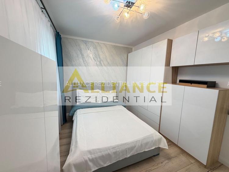 Casa P+1+M cu teren de 650 mp, piscina si curte complet amenajata