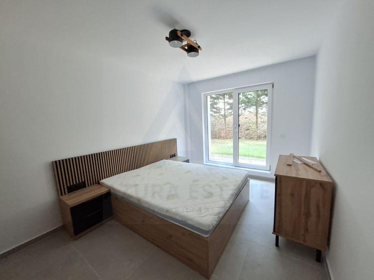 Apartament premium 61.4 mp utili 3 camere 2 bai curte 50 mp Cristian