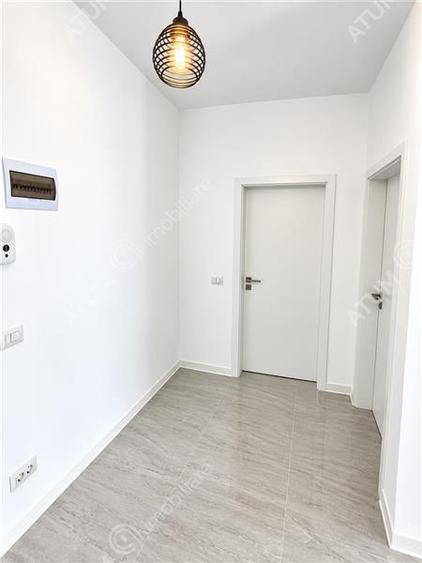 Garsoniera moderna la etajul 1 cu boxa depozitare si parcare proprie