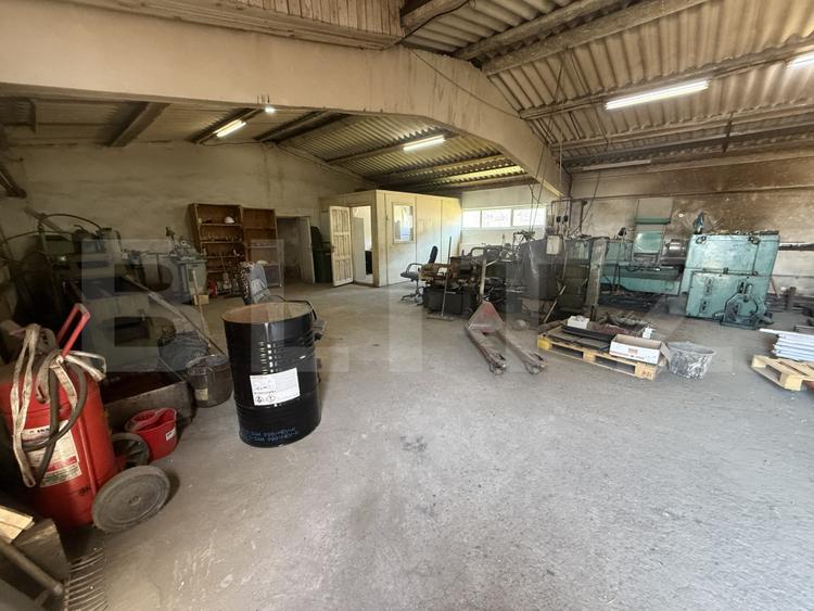 Atelier industrial 1.050 mp, utilat, 4 căi de acces – SAGRICOM