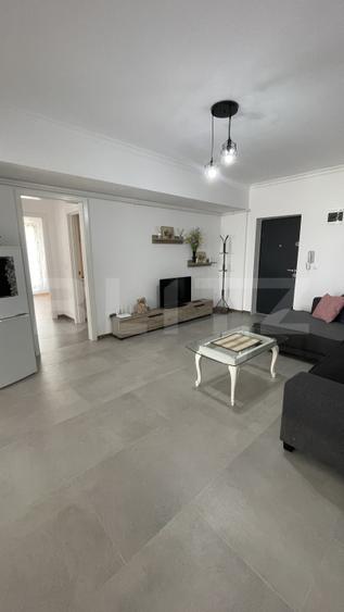 Apartament bloc nou, 72 mp, 2 dormitoare si living, parter, zona Nord