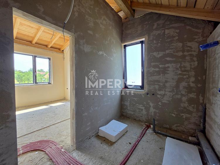 Casa individuala cu 6 camere si garaj pentru doua masini!