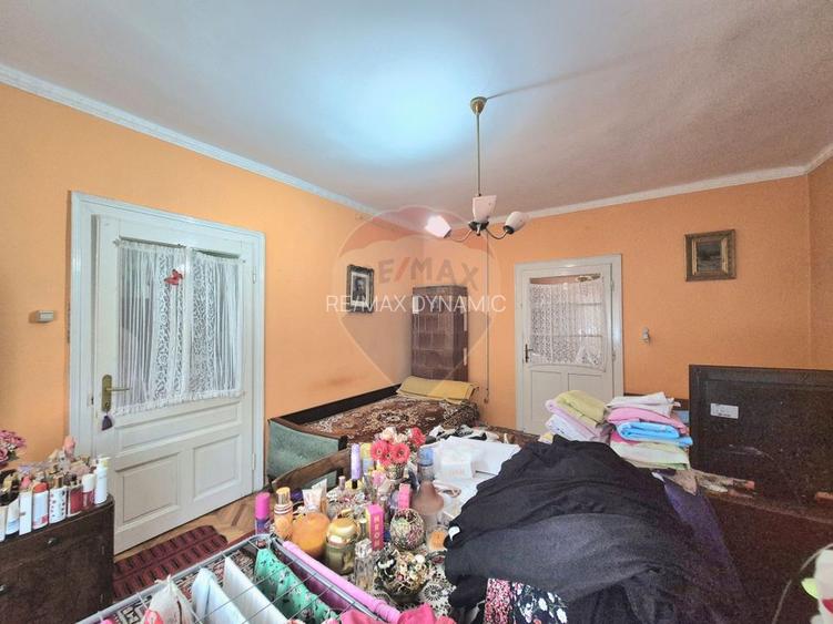 Casă cu teren generos de 1.100 mp, de vânzare în cartierul Pârneava – - 12