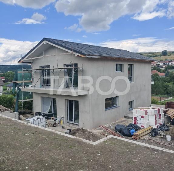 Casa individuala in Chinteni de vanzare 5 camere si curte generoasa