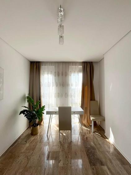 Apartament 3 camere, 67 mp utili cu terasă și parcare subterană West Residence.