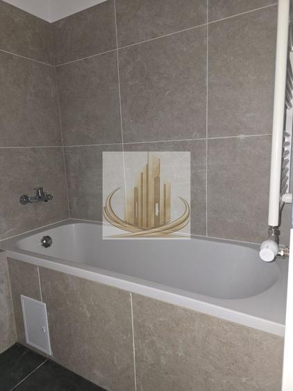 Apartament 2 camere, 55 mp, curte proprie 23 mp și parcare subterană