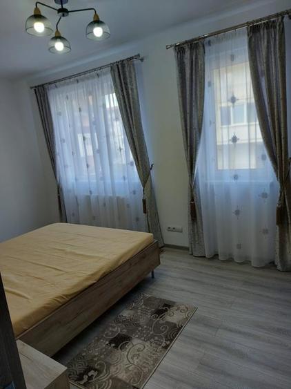 Apartament cu 3 camere,etaj intermediar,parcare subterana,zona Eroilor