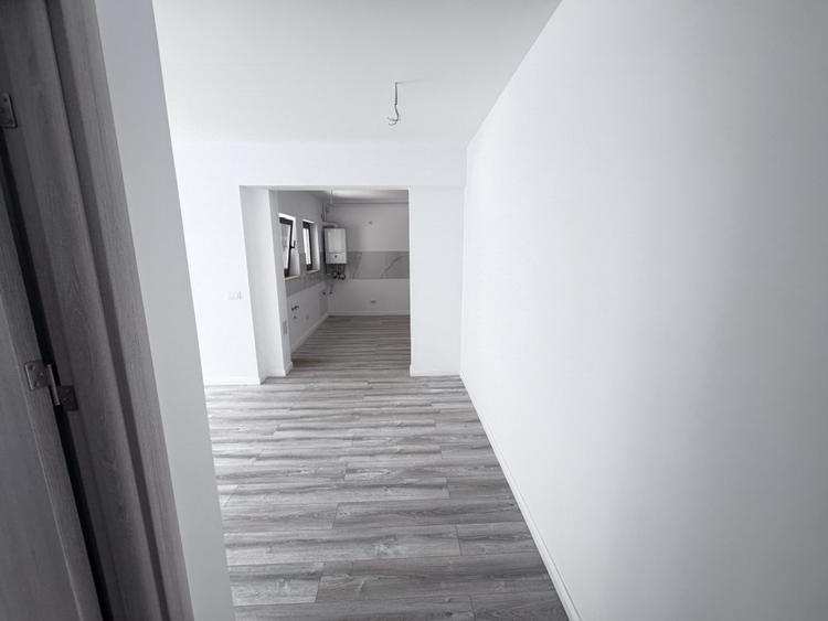 Apartament cu 2 camere-de inchiriat-bloc nou-parcare proprie