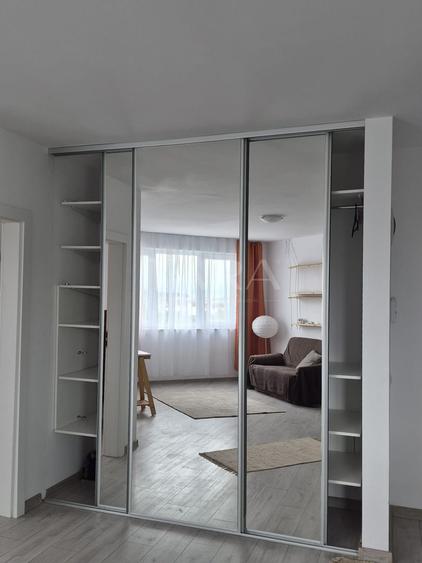 Apartament modern cu birou și panoramă deschisă – zona BMW.