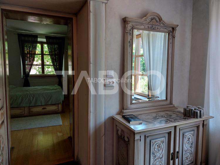 Casa saseasca P+1E+M 216 mpu curte libera 175 mp Cisnadioara - 14