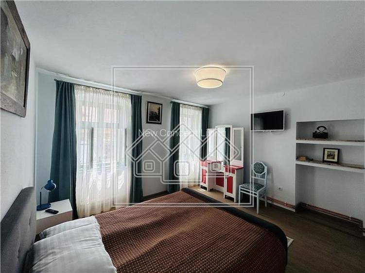Casa cu 6 apartamente + gradina - pretabil investitii - 24