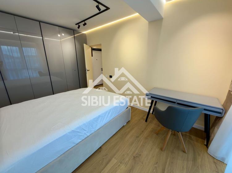 Apartament central finisare premium parcare subterana imobil nou