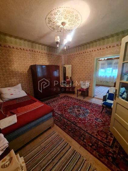 Casă cu teren de 1.000 m² – utilități complete, ideală pentru renovare