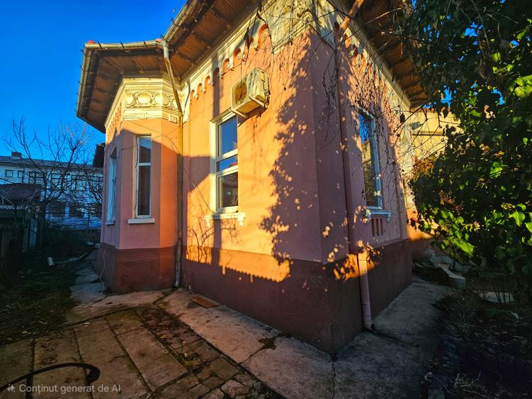 Casă cu arhitectură interbelică, 5 camere, teren 409 mp – Central