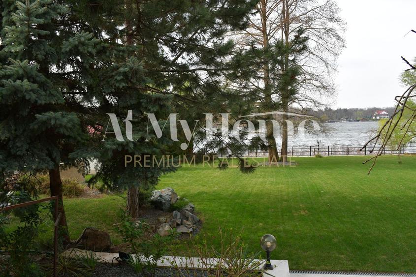 Vila unica pe malul Lacului Snagov, piscina si garaj ambarcatiuni, teren 1750 mp