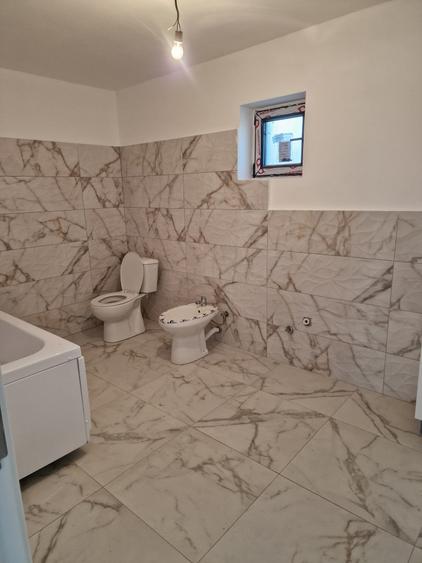 Sanmihaiul Roman - Casa individuala cu 4 camere si bucatarie inchisa