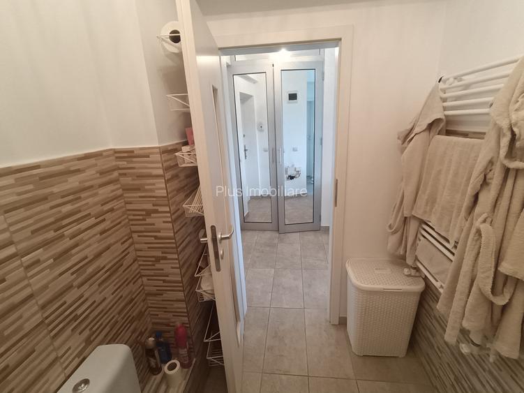 Apt 2 cam. 49.81 m.p. mobilat si utilat, loc de parcare subteran+boxa-33.03 m.p. - 17