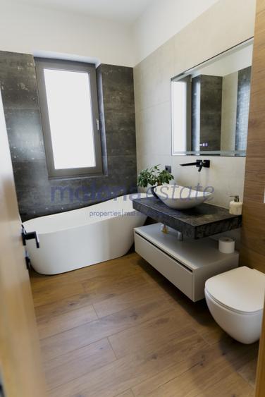 Proprietate rezidențială, cu două apartamente private, în Andrei Muresanu