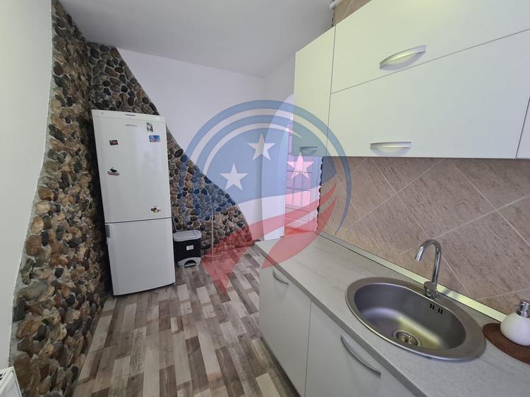 Apartament ultra central cu 2 camere decomandat complet utilat