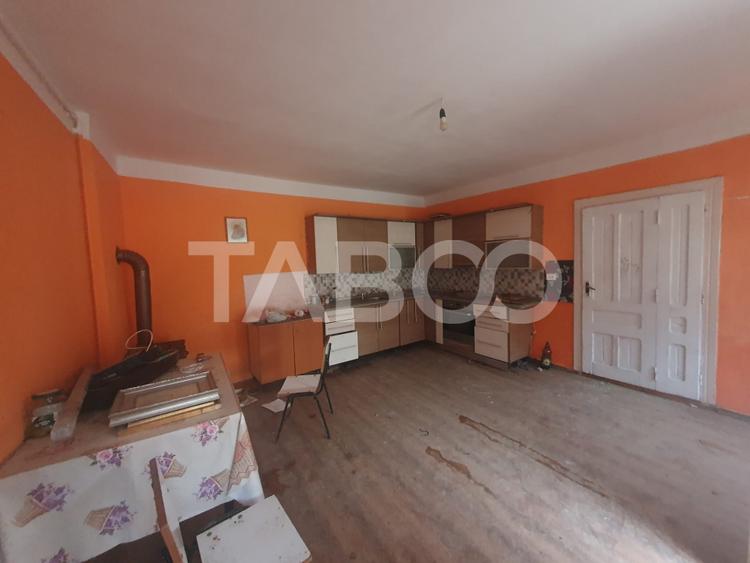 Casa de vanzare in Grid 87 mp utili + anexe beci si sura