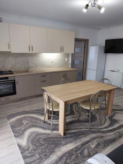 Apartament cu 3 camere,etaj intermediar,parcare subterana,zona Eroilor