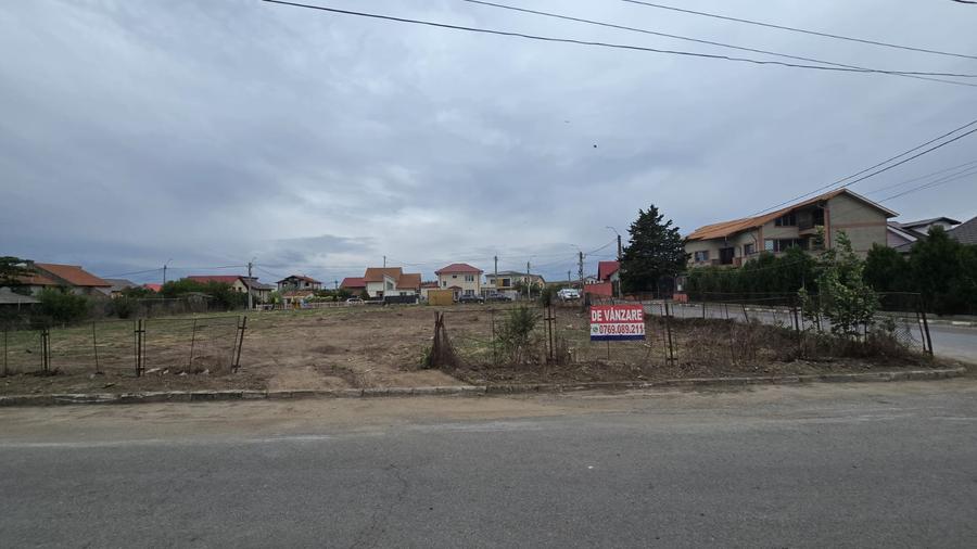 Teren intravilan 2289 mp deschidere la 3 strazi utilitati langa