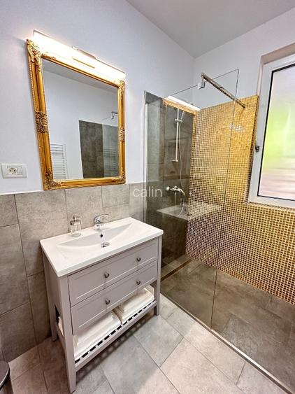 Închiriez apartament 2 camere, cu gradina amenajată in bloc nou.