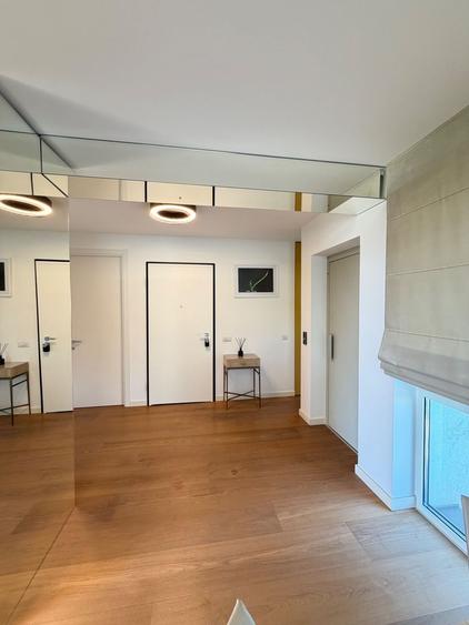 Apartament PREMIUM cu curte, terasă și lift cu acces direct în living