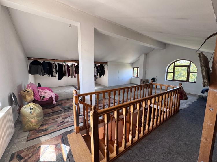 Casa individuala P+1+M amplasata pe un teren de 1612 mp.