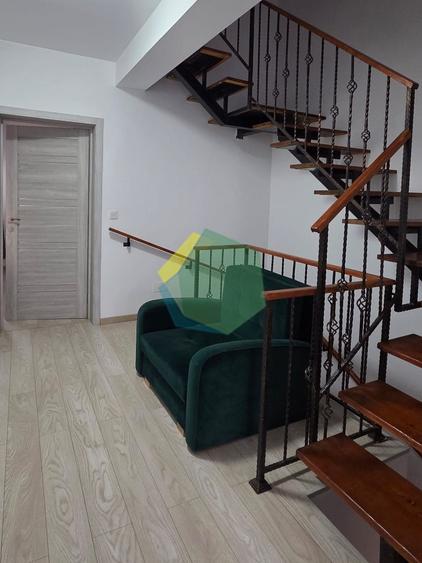 Casă tip duplex P+1+M, cu mansardă de 50 mp și curte generoasă
